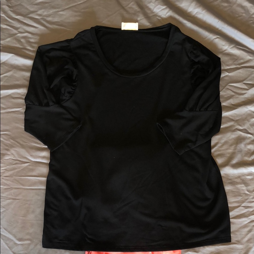 Elbow sleeve top